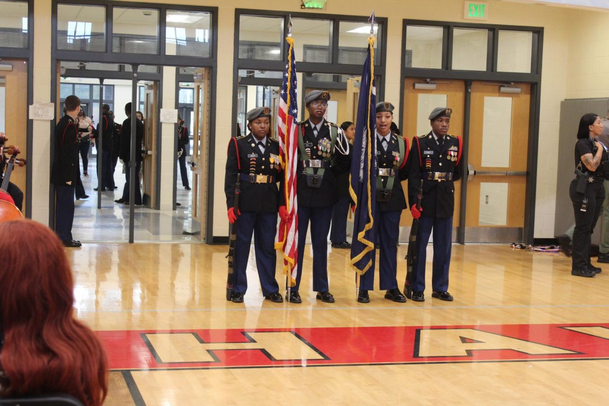 The Redhawk Battalion presenting the state and American flag at the Veterans Day Assembly on November 8th, 2024