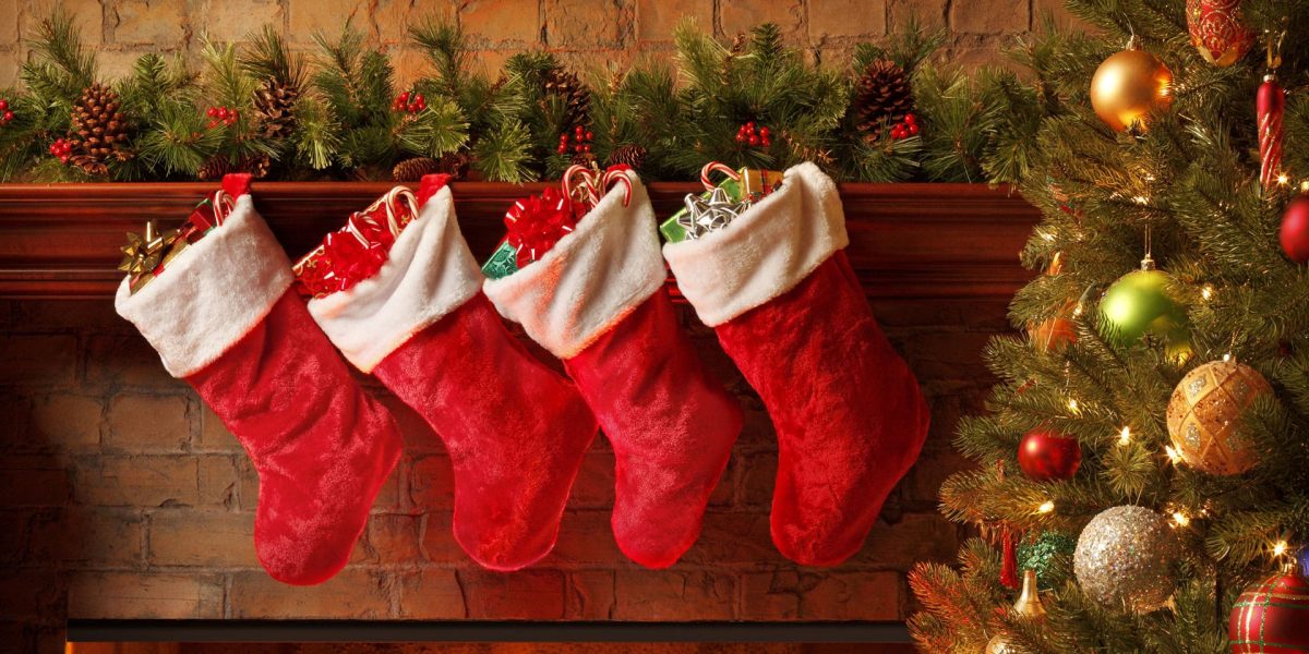 Christmas Stockings filled with candies and small presents. 